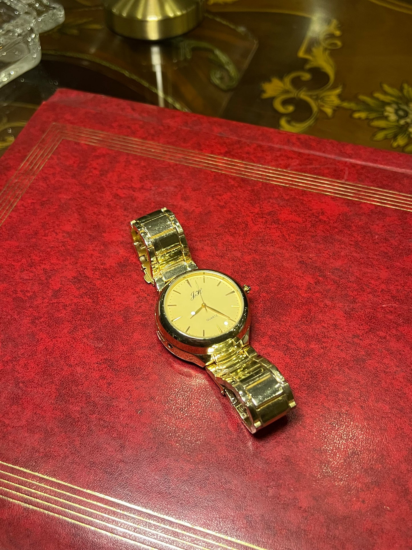 Golden lighter watch