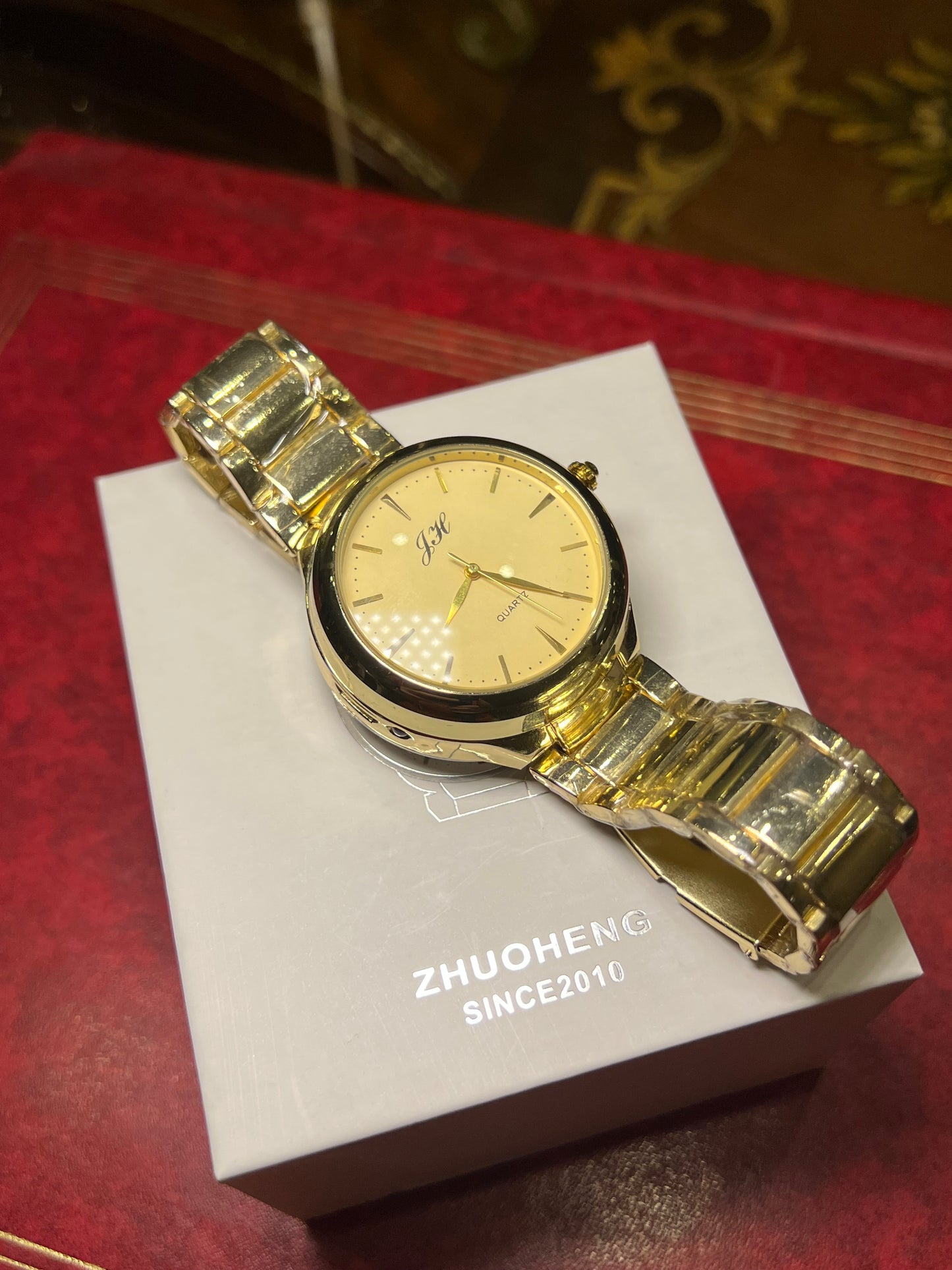 Golden lighter watch